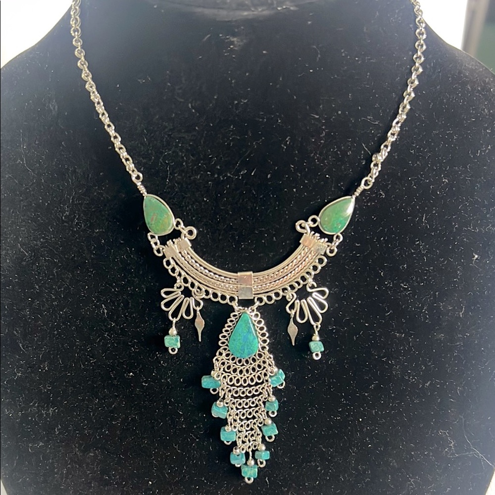 Elegant Silver and Turquoise Necklace and earrings.